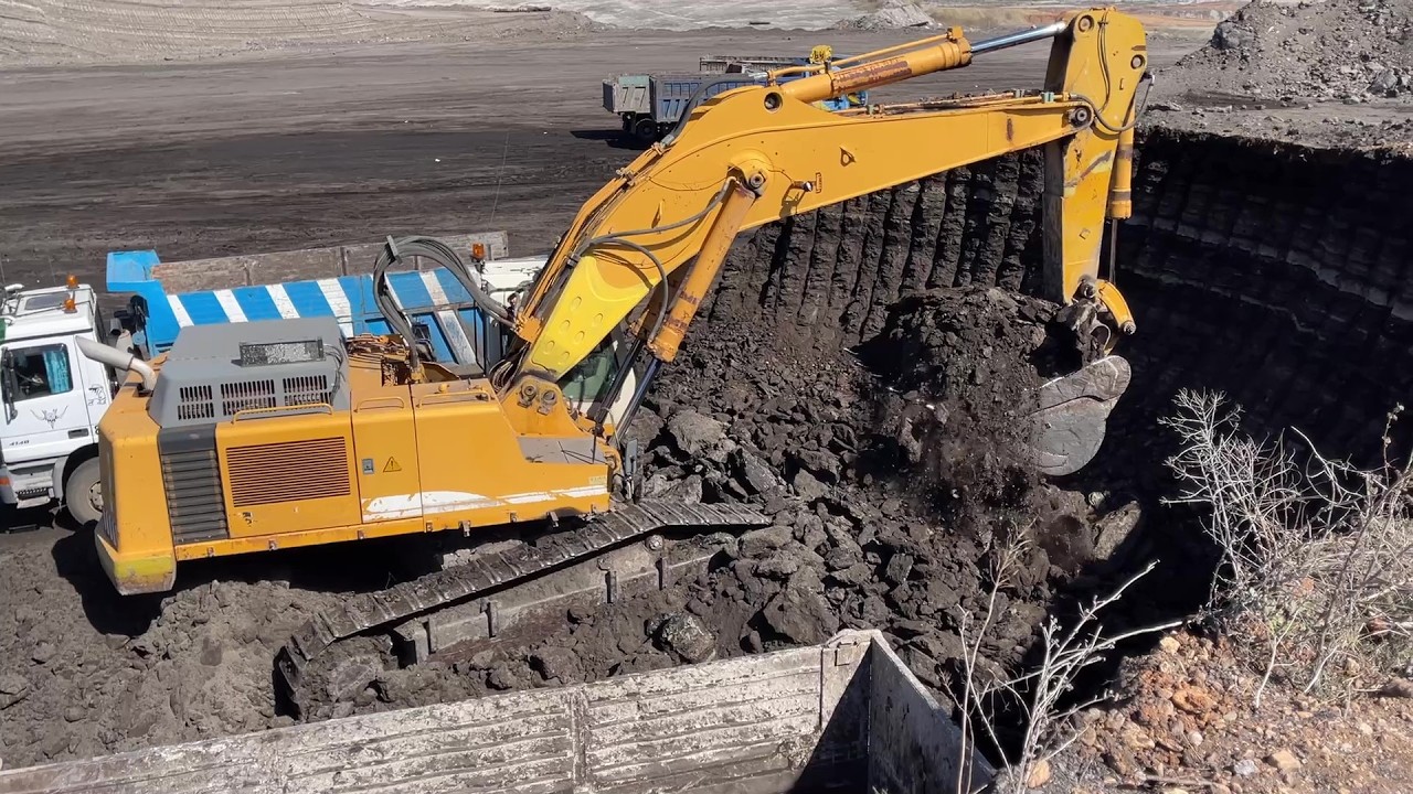 Liebherr 964 Excavator Loading Overburden At Busy Coal Mine