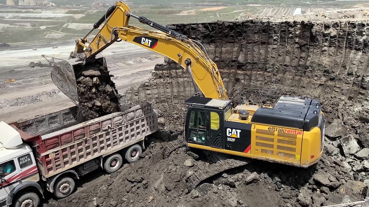 Power At The Mine: Caterpillar 352F Excavator Loads Overburden On Mercedes & MAN Trucks - Ascon Ltd